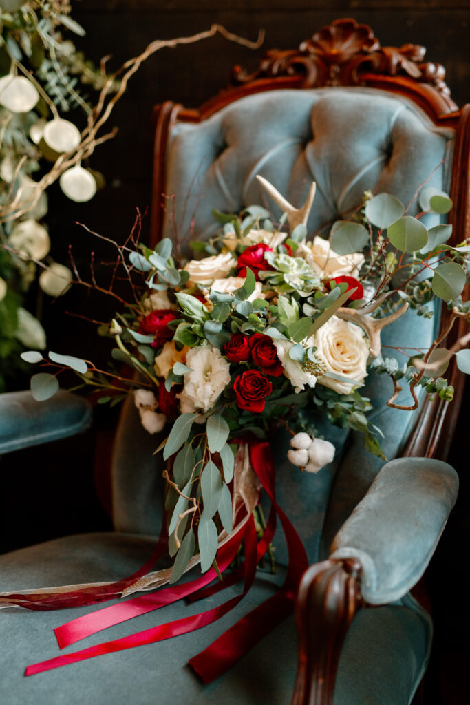 winter bouquet on a chair. Upstate NY wedding photographer