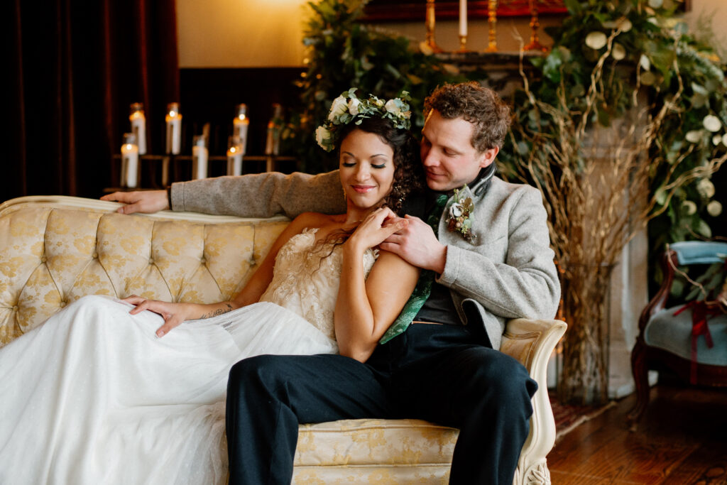 newlyweds on sofa.  NY elopement photographer