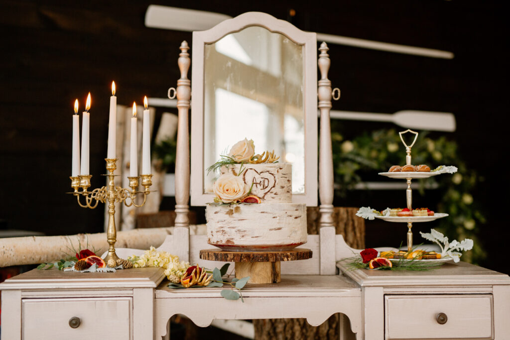 pretty wedding cake and dessert table. 