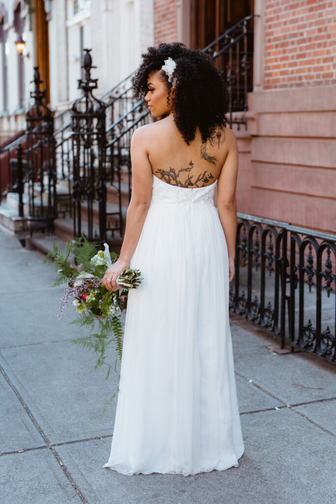 bride on city street.  Troy NY wedding